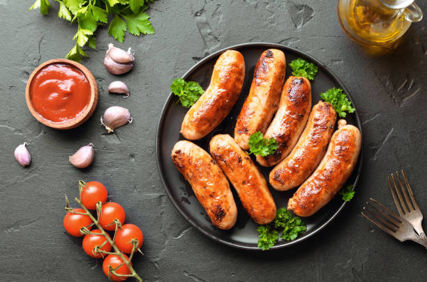 istock Barbecue sausage with fresh parsley 1173840542