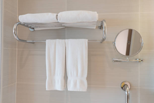istock Clean white towel on a hanger prepared in bathroom 1173842658