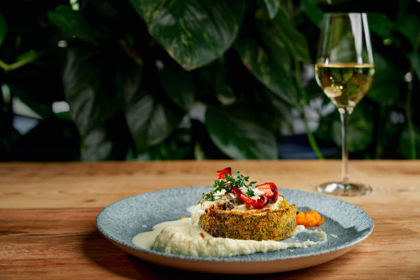 istock Tasty breaded fish with puree and grilled vegetables 1173843421