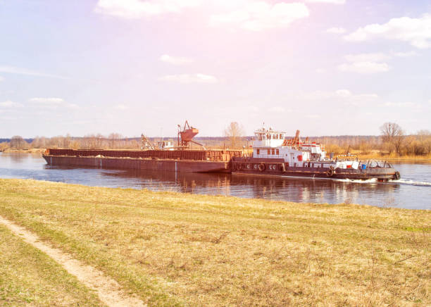 istock Extraction of construction river sand using a special vessel dredger, industrial, system, raw material 1173847337