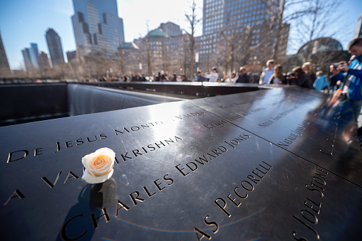 Tourists are visiting 9/11 Memorial. National September 11 Memorial site in Lower Manhattan, New York City, Manhattan, USA.