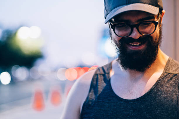 istock Millennial man eating outside 1173874968