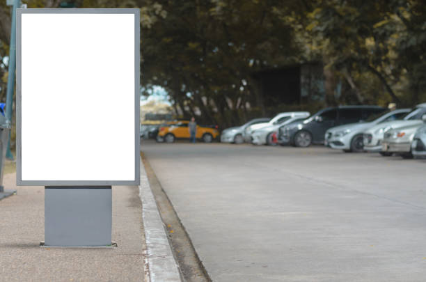 istock led blank billboard white screen side road in city. ad mockup copy space for advertising banner near bus stop in metropolis. 1173877830