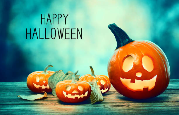 istock Happy Halloween with pumpkins at night 1173881279