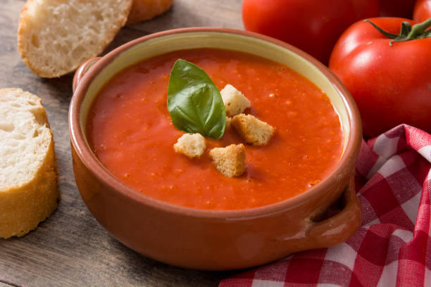 istock Tomato soup in brown bowl 1173883070