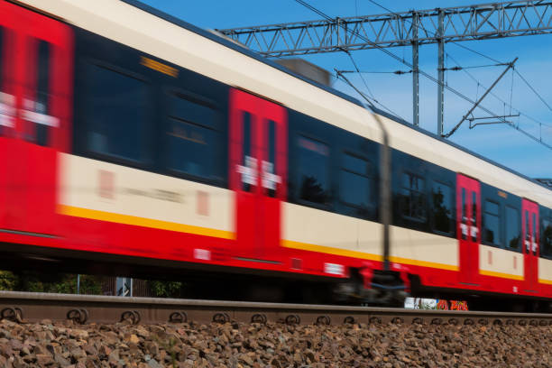 istock Speeding Train on suburban rails 1173885764
