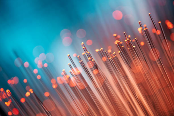 sfondo astratto in fibra ottica - blue data internet technology cable - fiber optic cable computer network abstract foto e immagini stock