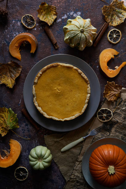 istock Pumpkin pie with cinnamon and vanilla on a plate. 1173894059