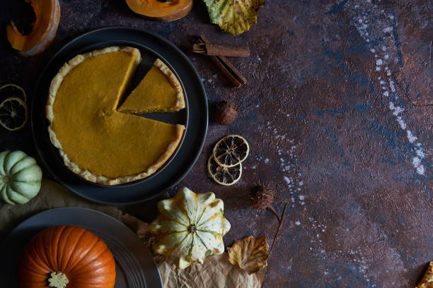 istock Pumpkin pie with cinnamon and vanilla on a plate. 1173894141