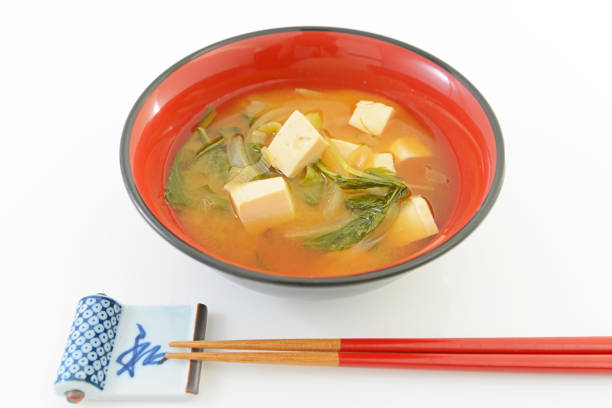 A bowl of miso soup isolated on white background