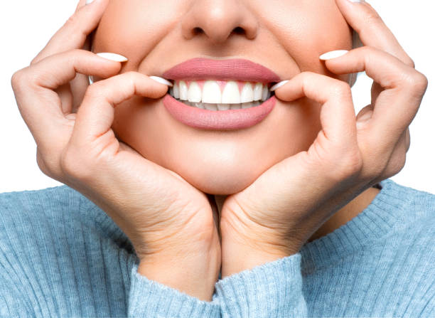 istock Happy smiling woman mouth with great teeth over white background. 1173896413