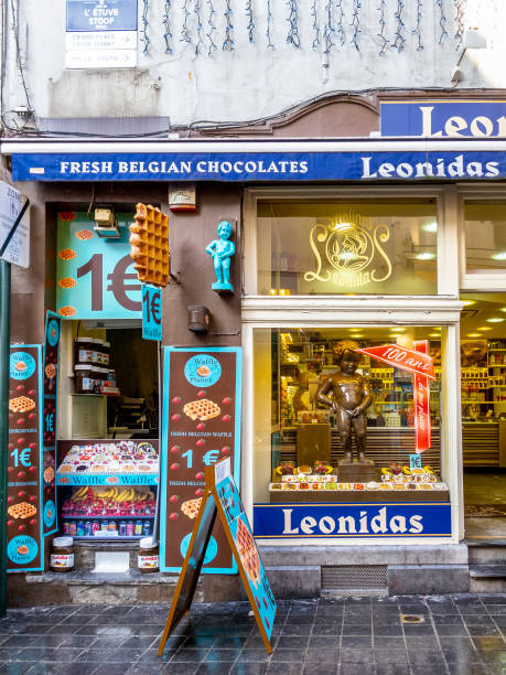 View from the street of Le Comptoir de Mathilde Artisanal Chocolate shop and market in the historic Normandy town of Bayeux, France.  Le Comptoir de Mathilde has been manufacturing since 2007 most of its fine food and chocolate recipes in an artisanal way , with the ambition of flying high the colors of quality French gastronomy.