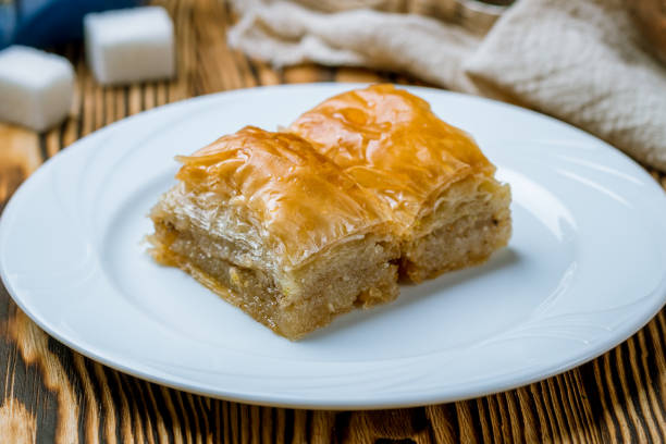 istock baklava with walnuts on wooden table. Turkish cuisine 1173904879