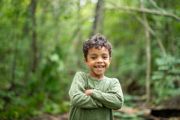 istock Group of children in forest 1173905705