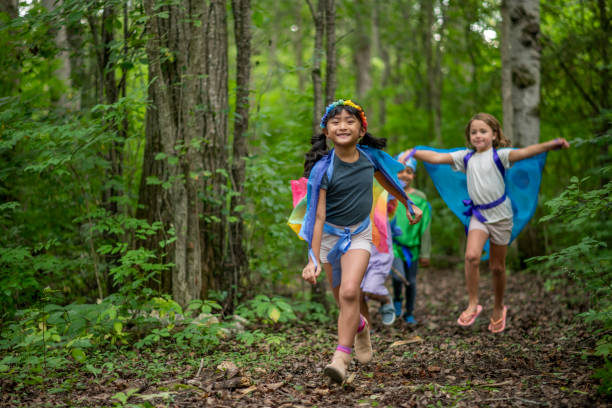 istock Group of children in forest 1173905711