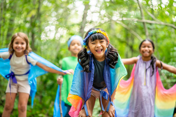 istock Group of children in forest 1173905713