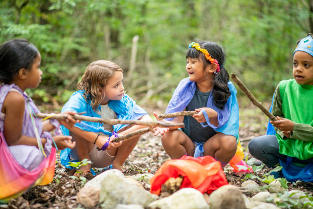 istock Group of children in forest 1173905719
