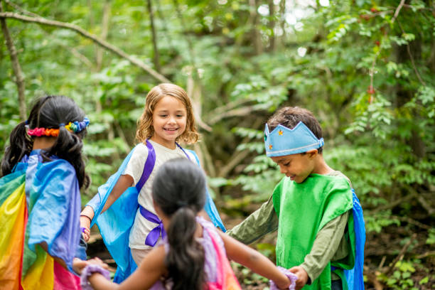 istock Group of children in forest 1173905723