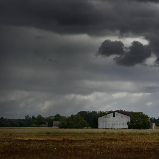istock Tornado storm clouds above the shed in the countryside 1173907906