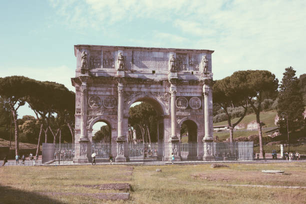 Rome, Italy - June 20, 2018: Triumphal Arch of Constantine in Rome, situated between the Colosseum and the Palatine Hill