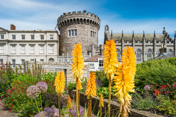 Dublin, Republic of Ireland - July 14, 2011: A tour group enters Dubhlinn Gardens in Dublin Castle. It was the Dubhlinn (dark) pool originally on this site which gave Dublin its name.