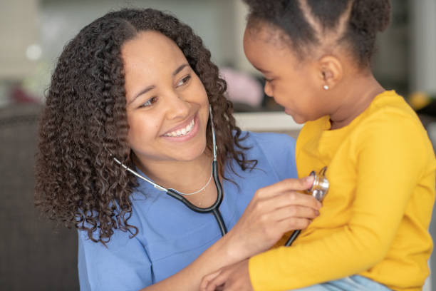 istock Female pediatrician with patient 1173915168