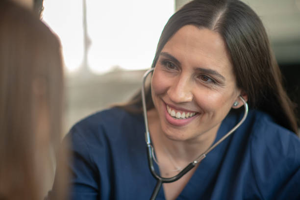 istock Female pediatrician with patient 1173915343