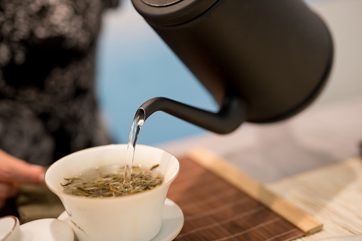 Pouring hot water over green tea leaves, Nikon Z7