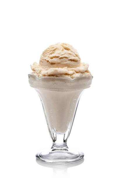 istock Vanilla ice cream sundae cup on white background 1173918218