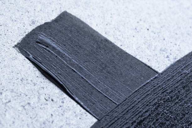 istock Black slate paint brush to draw 1173922633