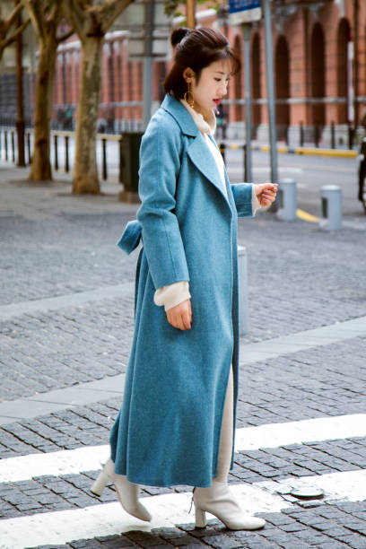 istock Blue jacket worn on a beautiful Asian girl 1173922674