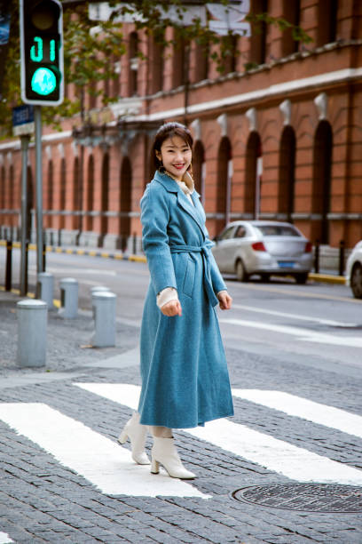istock Blue jacket worn on a beautiful Asian girl 1173922678