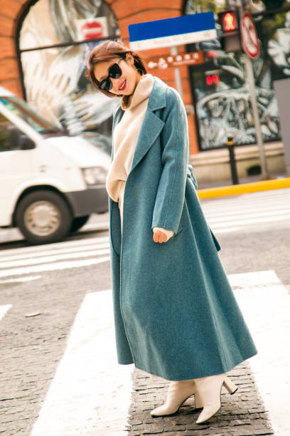 istock Blue jacket worn on a beautiful Asian girl 1173922753