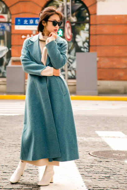 istock Blue jacket worn on a beautiful Asian girl 1173922831