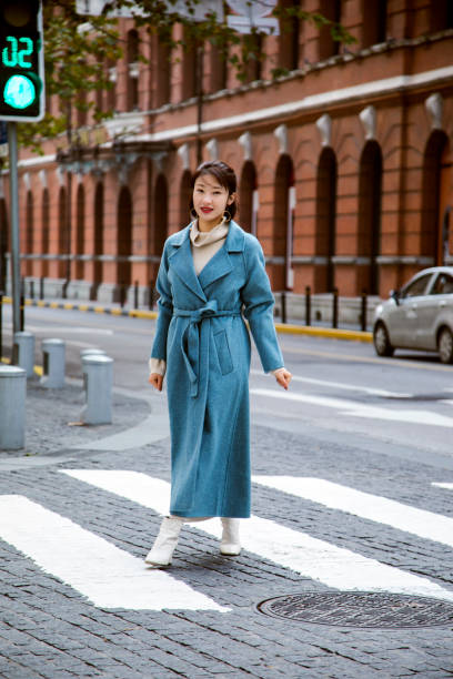 Blue jacket worn on a beautiful Asian girl