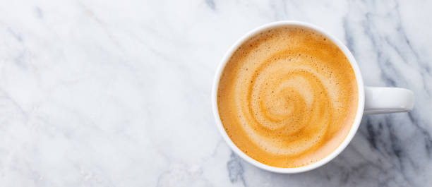istock Coffee, espresso in white cup of marble table background. Top view. Copy space. 1173928865