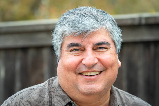 istock Smiling Mature man looking at camera 1173929627