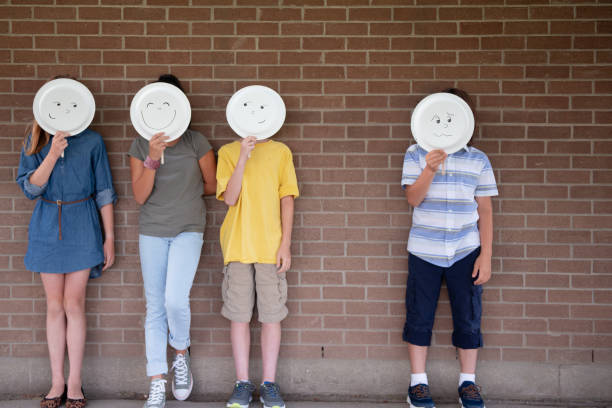 istock Social exclusion in elementary school schoolyard 1173930356