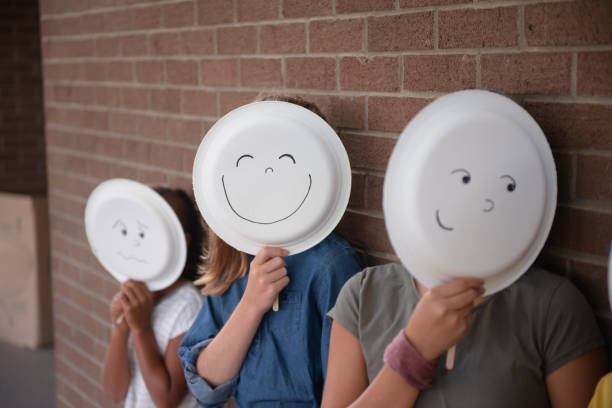 istock Happy elementary school child demonstrated by paper plate concept 1173930371