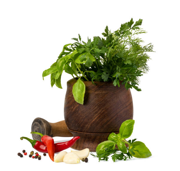 istock Fresh spices and herbs in mortar 1173935309
