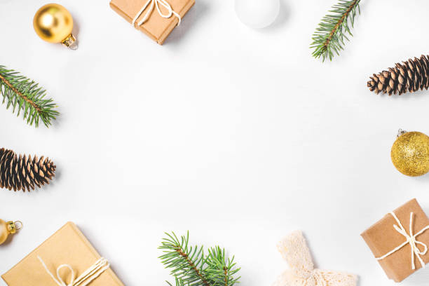 istock Frame of Christmas decorations on white background 1173936407
