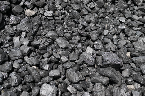 istock Pile of natural black hard coal or diamond coal background 1173936758