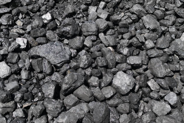 istock Pile of natural black hard coal or diamond coal background 1173936774