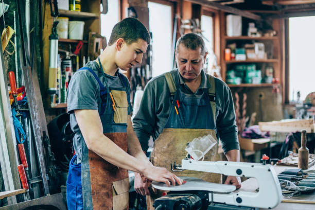 istock Father and son carpenters 1173941490