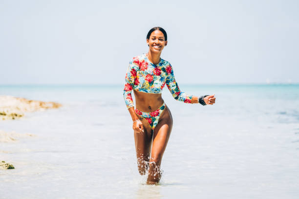 istock Teenage boy at tropical beach 1173948430
