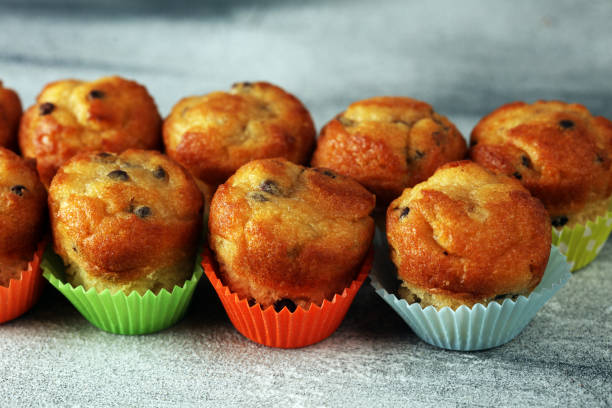 istock Chocolate muffin and nut muffin, homemade bakery on beautiful rustic background 1173948728