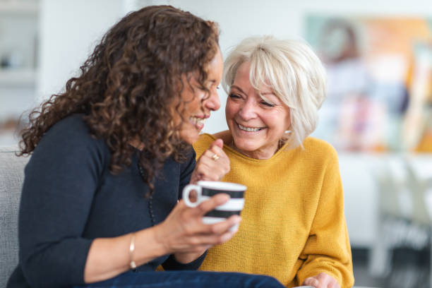 istock Senior female friends having tea 1173952967