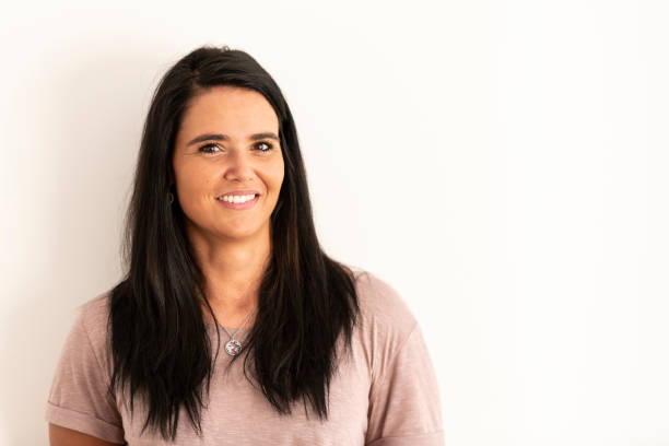 istock Smiling young woman looking at camera 1173959531