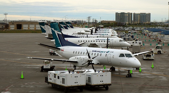 An Air Transat airplane parking at Pearson International Airport - the primary international airport serving Toronto, Golden Horseshoe.