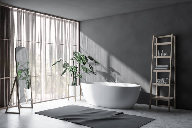 istock Gray and light wood bathroom corner with shelves 1173965716